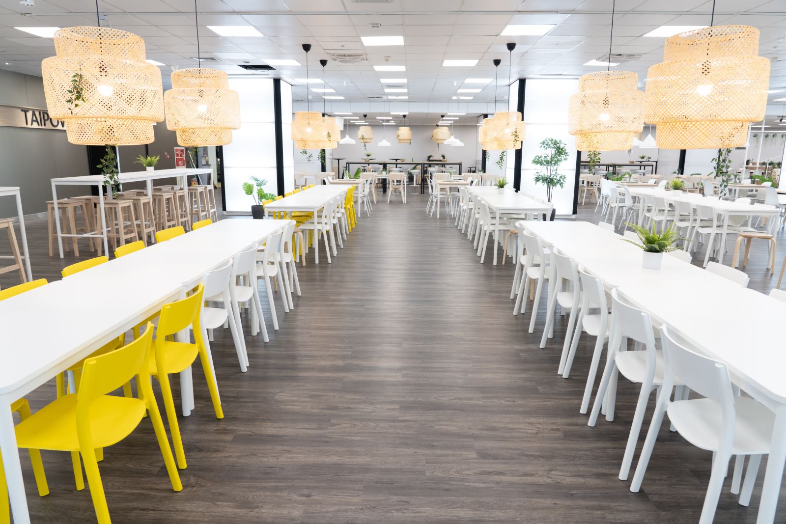 picture one, renovatied staff dining room with long tables and chairs